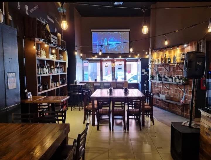 Restaurant and bar seating at Hotel Plaza Querétaro